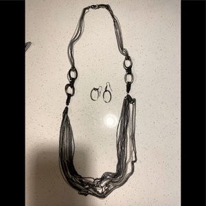 Long accent necklace with matching earrings!